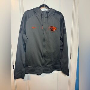 This is a Nike Oregon State Beavers Therma-FIT full-zip hoodie jacket.